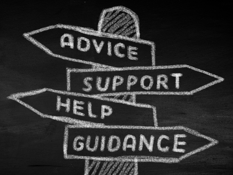 Black and white picture with a sign with Advice, Support, Help and Guidance on it